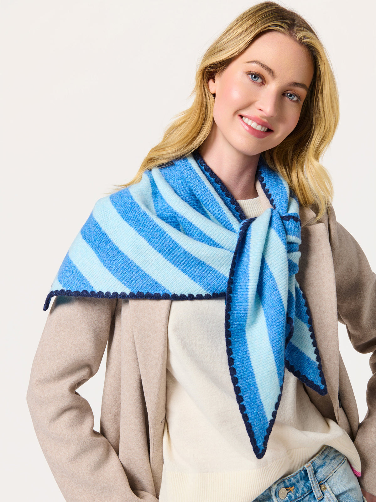 Shiraleah Joy Large Triangle Scarf in blue and light blue stripes, acrylic, polyester and wool knit, draped on model, detail view