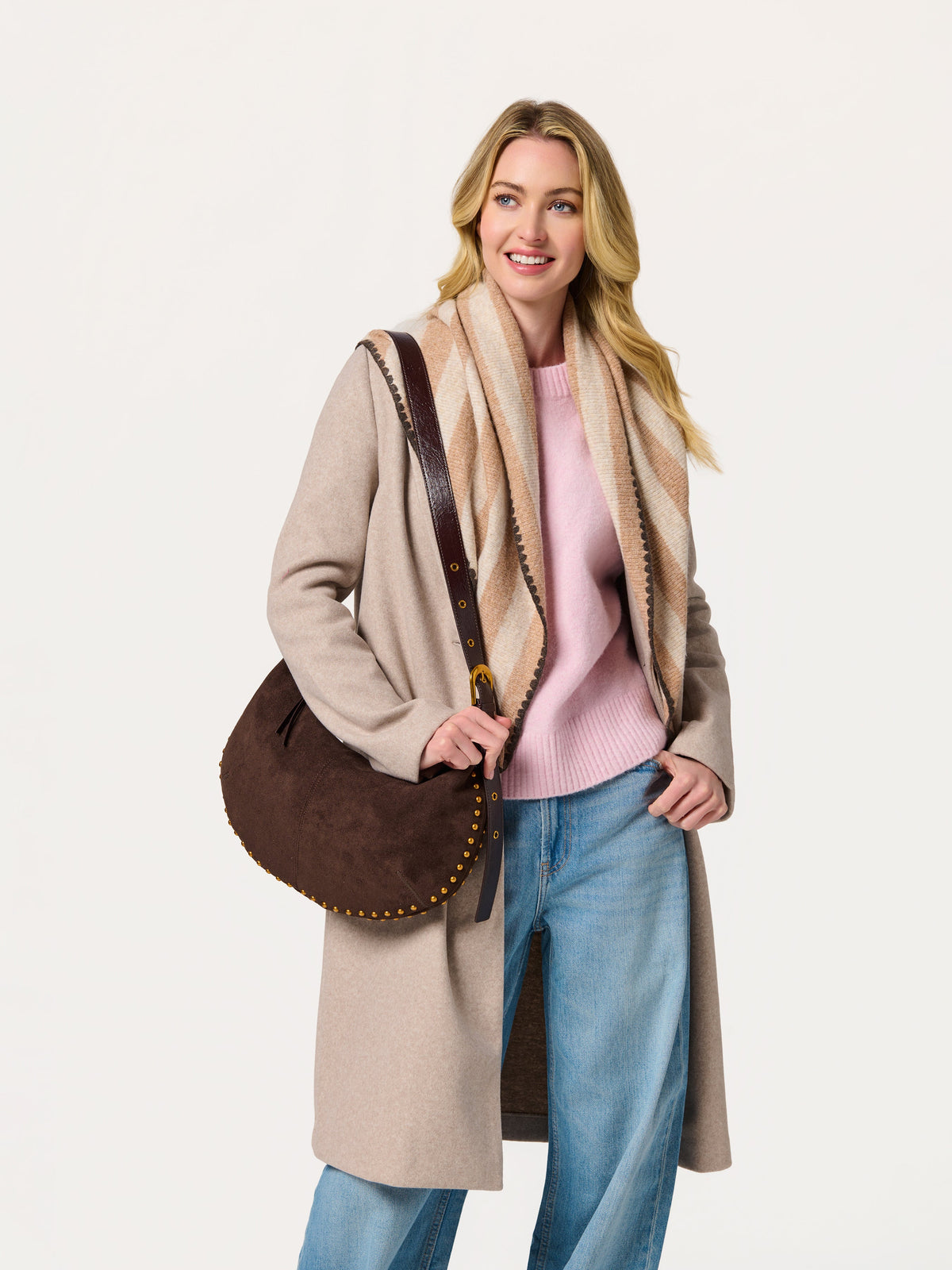 Shiraleah Joy Large Triangle Scarf in oatmeal and brown stripes, acrylic, polyester and wool knit, full-length outfit on model with brown bag, lifestyle view
