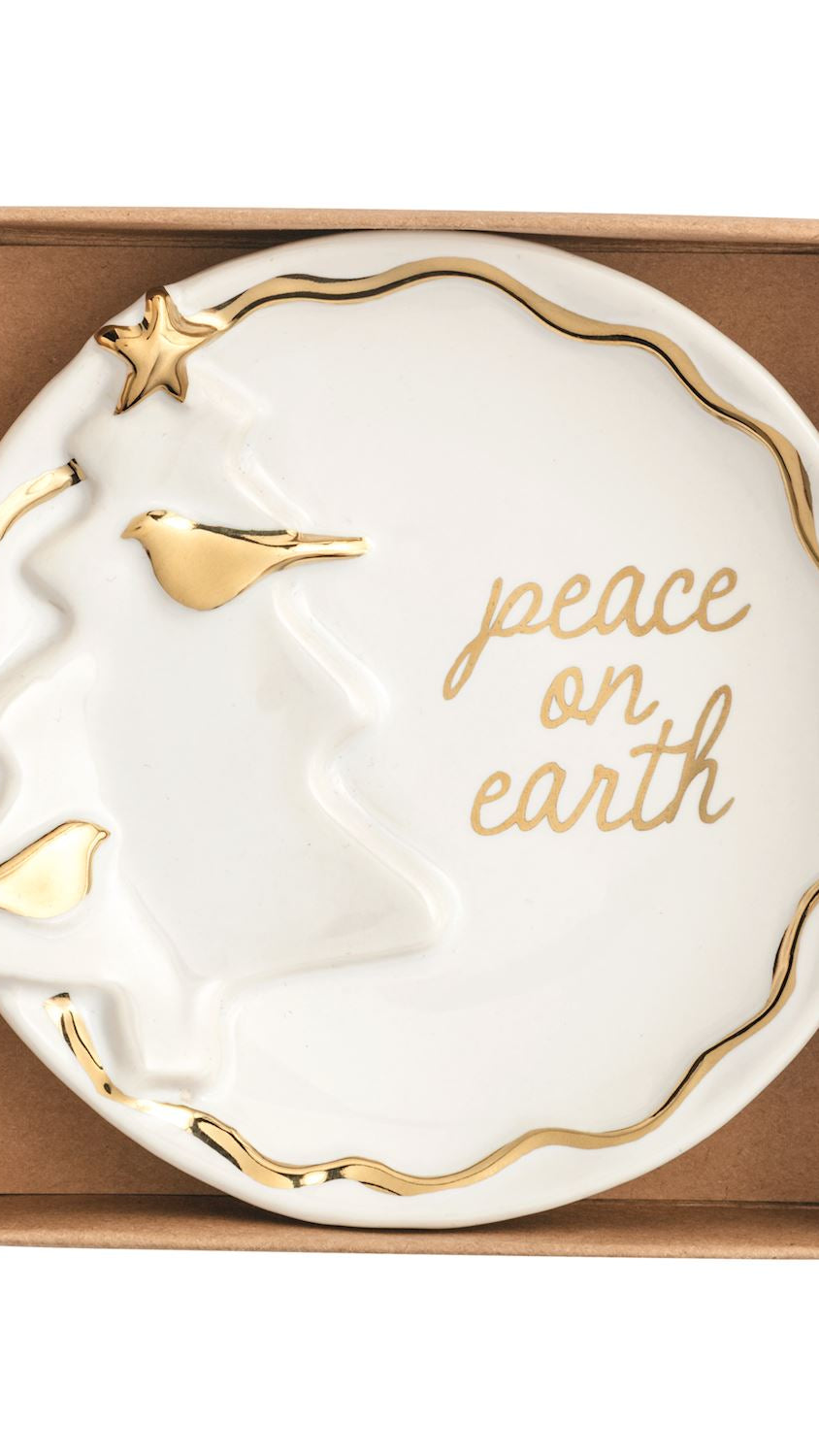 Gold trinket dish with a Christmas tree motif, front view