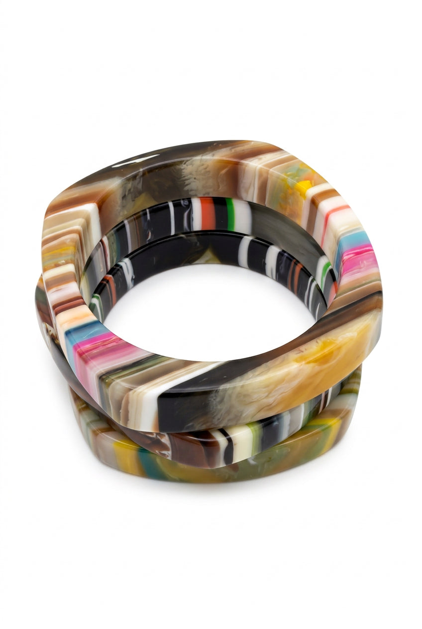 Square multicolor resin bangle bracelets in tan, black, pink and cream stripes, stacked view.