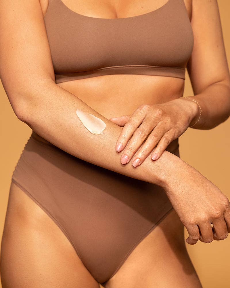 Gradual body tan lotion product photo - in use view - BLVD Boutik