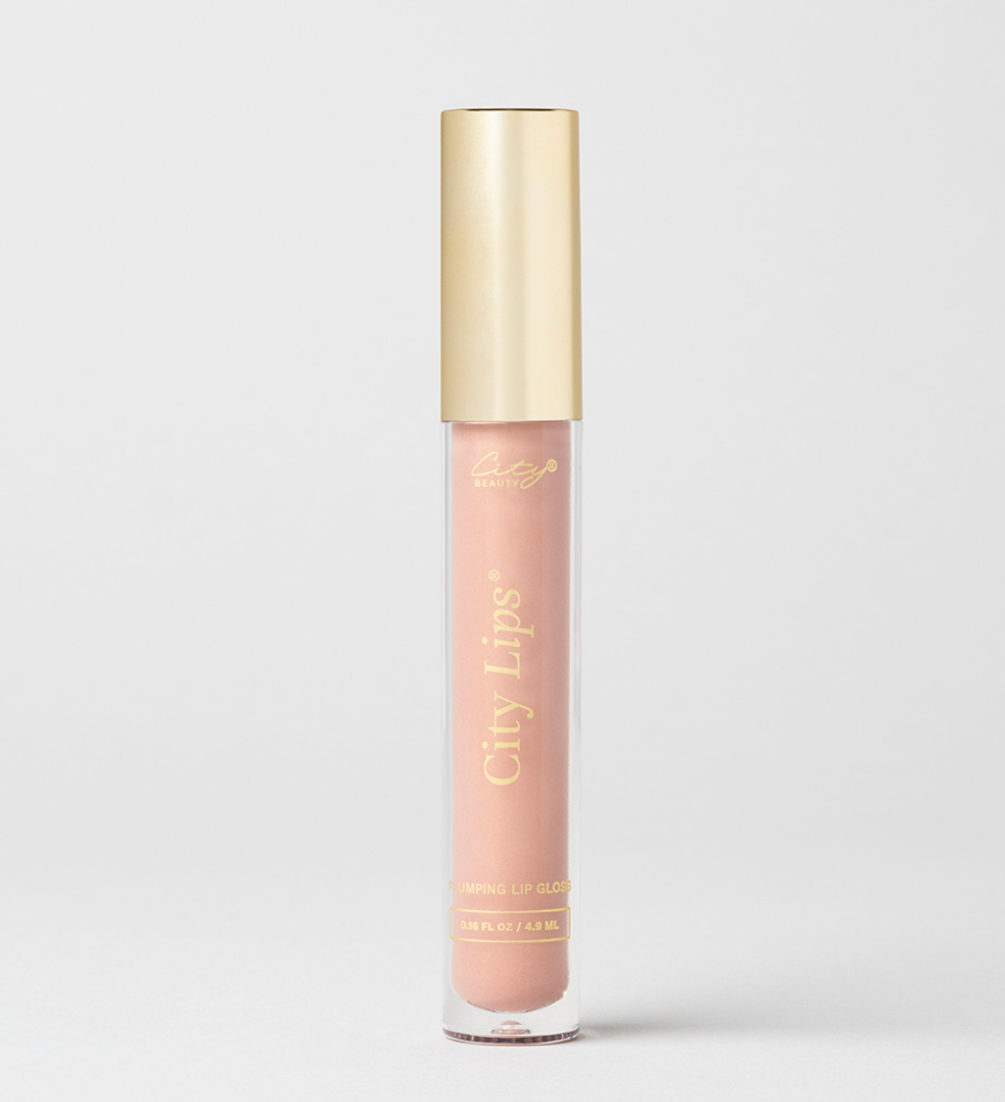 City Lips plumping lip gloss in Tokyo Kiss, a sheer cool-nude shade
