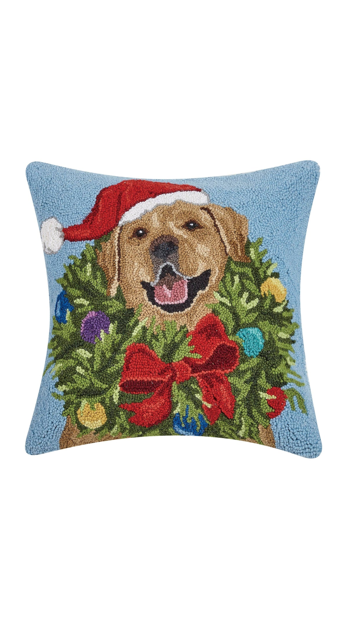 Hooked wool pillow of a golden Labrador in a Santa hat with holiday wreath, full view on white