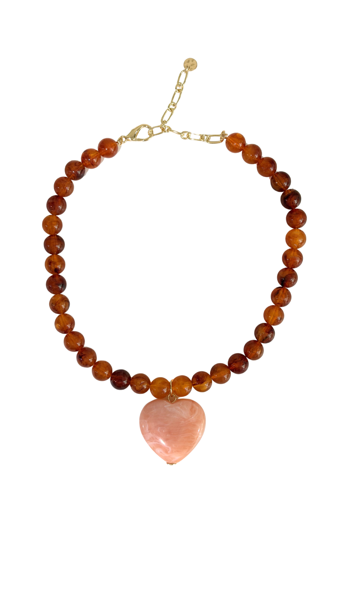 Necklace with brown beads and a pink heart-shaped pendant on a white background