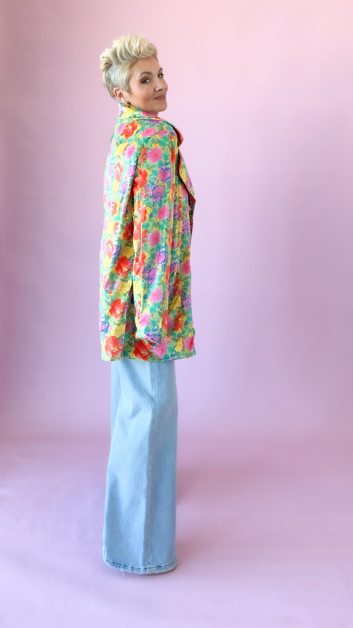 Back view looking over shoulder in the oversized floral velvet blazer