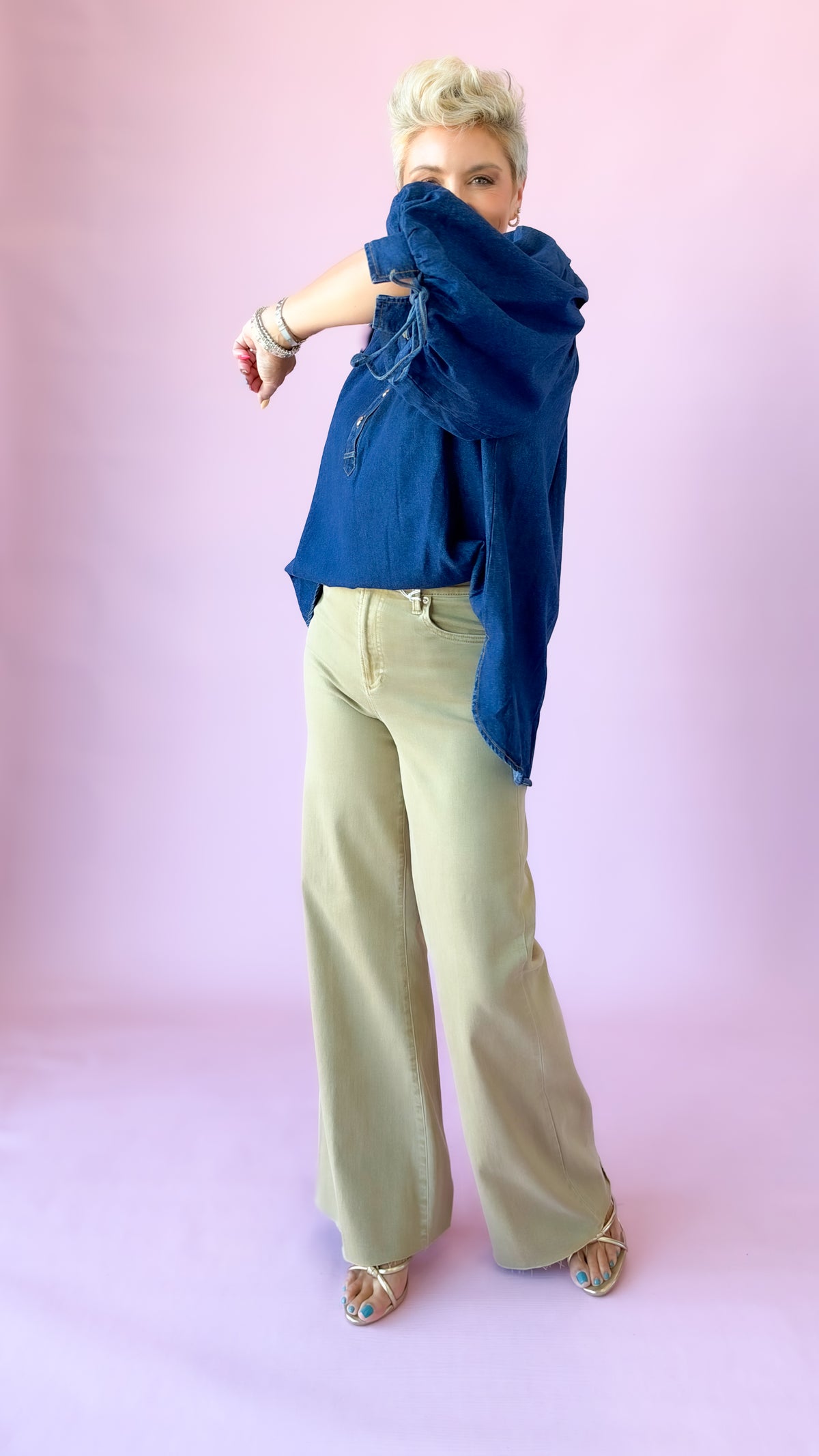 Side view of dark denim Ingrid top with khaki wide-leg pants