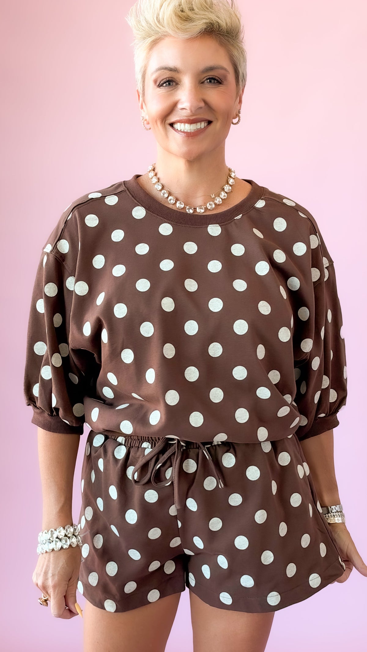 Brown and white polka dot lounge top with puff sleeves and matching shorts