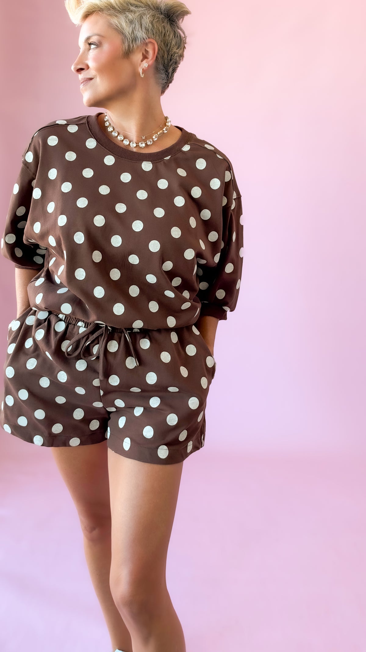 Side close-up of brown polka dot lounge top