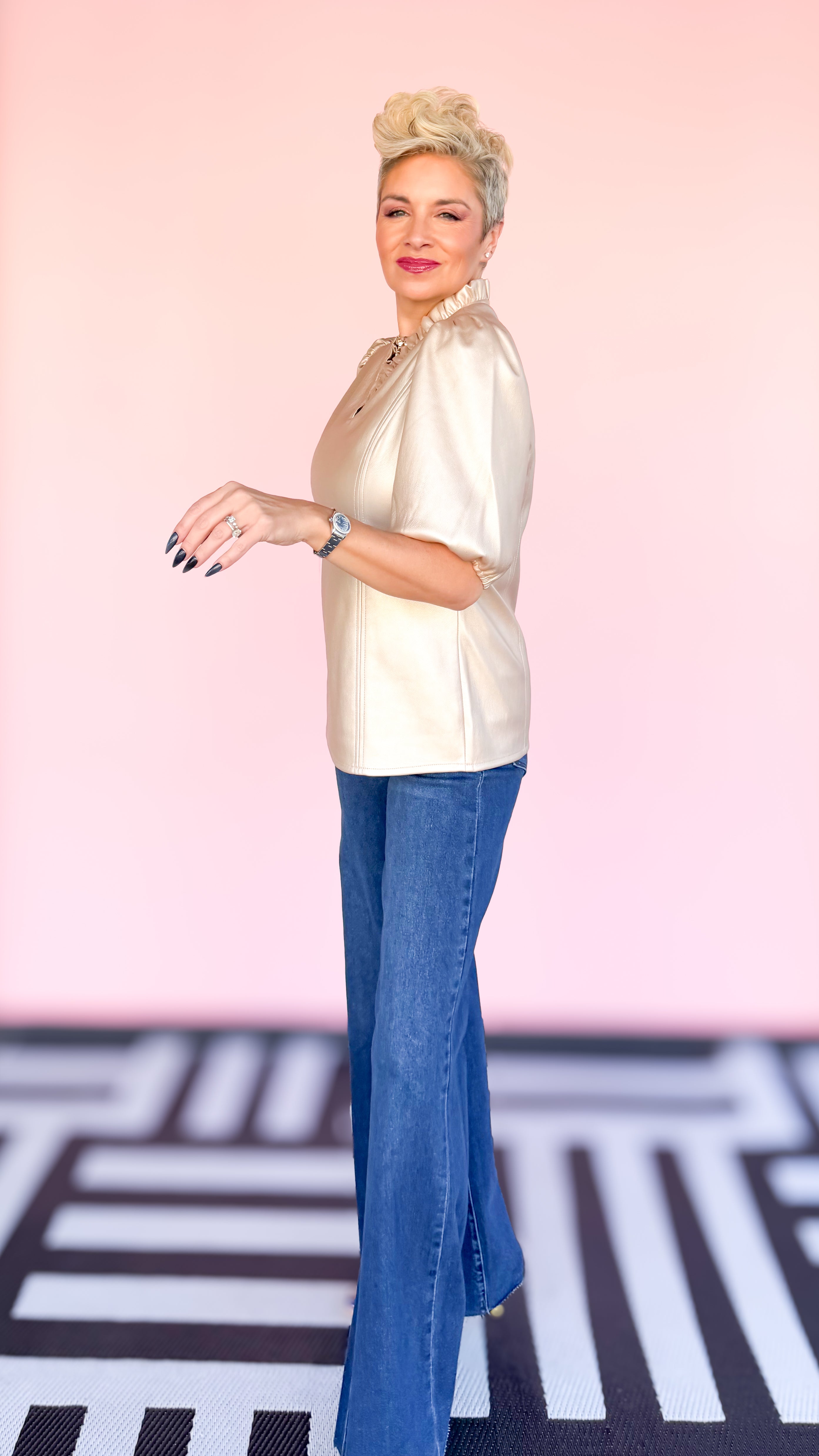 Faux leather ruffle v-neck top in gold worn on model - side view - BLVD Boutik