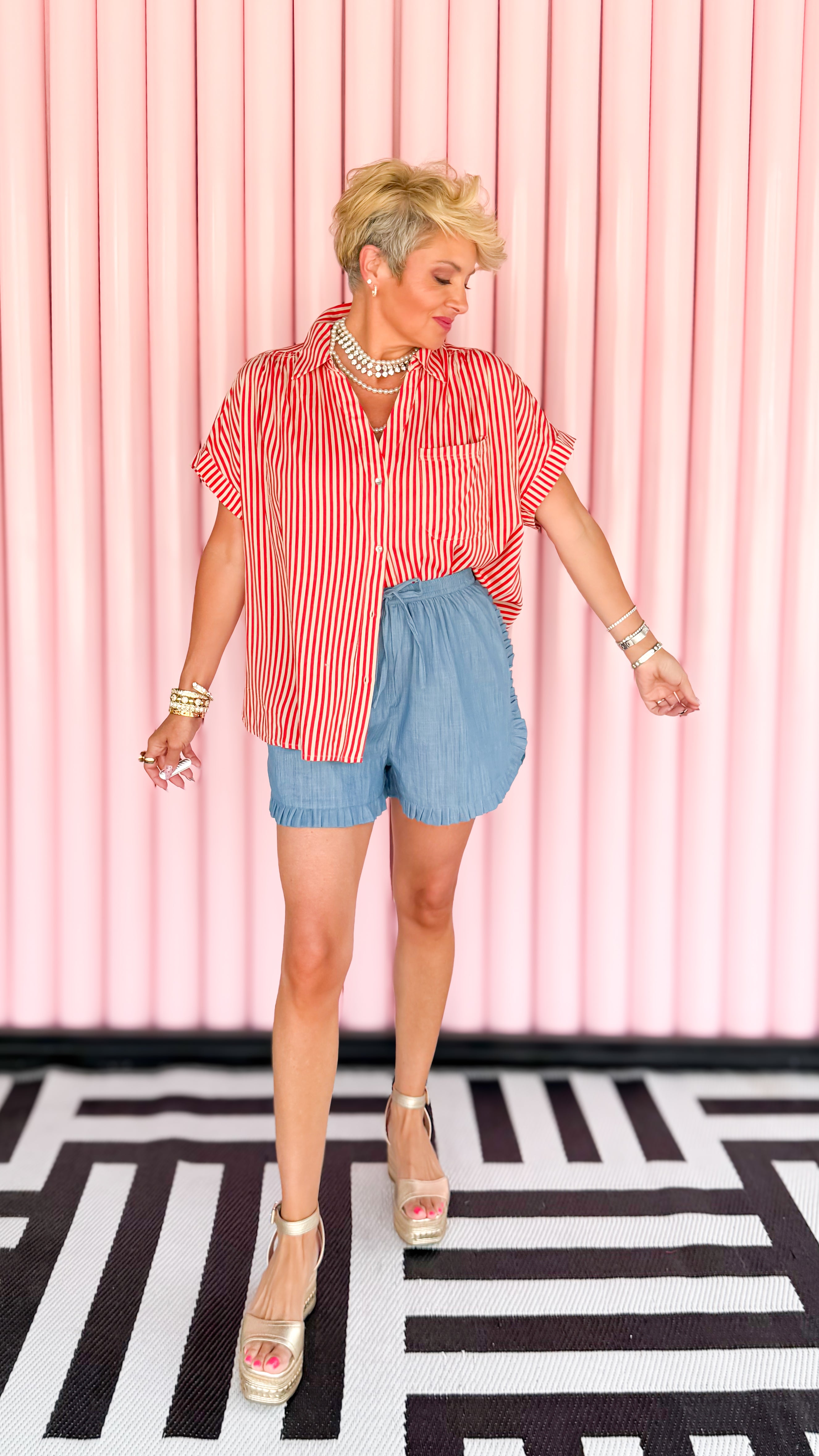 Collared roll-up sleeve top in red worn on model - side view - BLVD Boutik