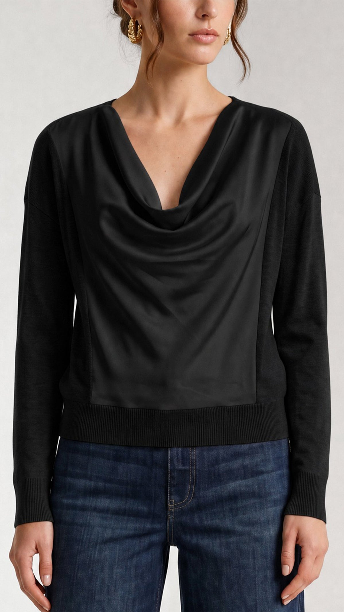 Black draped cowl neck mixed media sweater styled with blue jeans