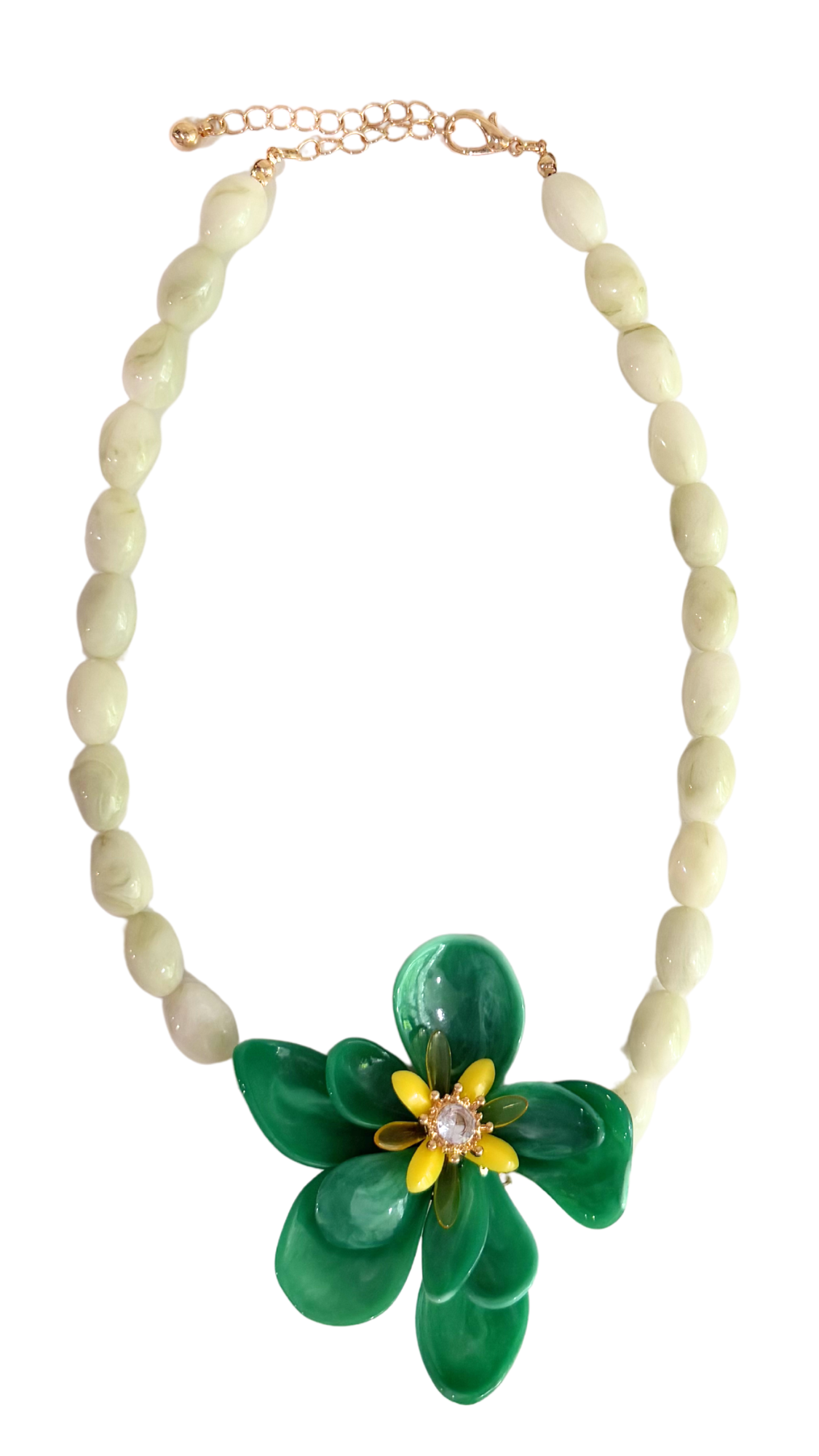 Necklace with green flower pendant and beige beads on a white background