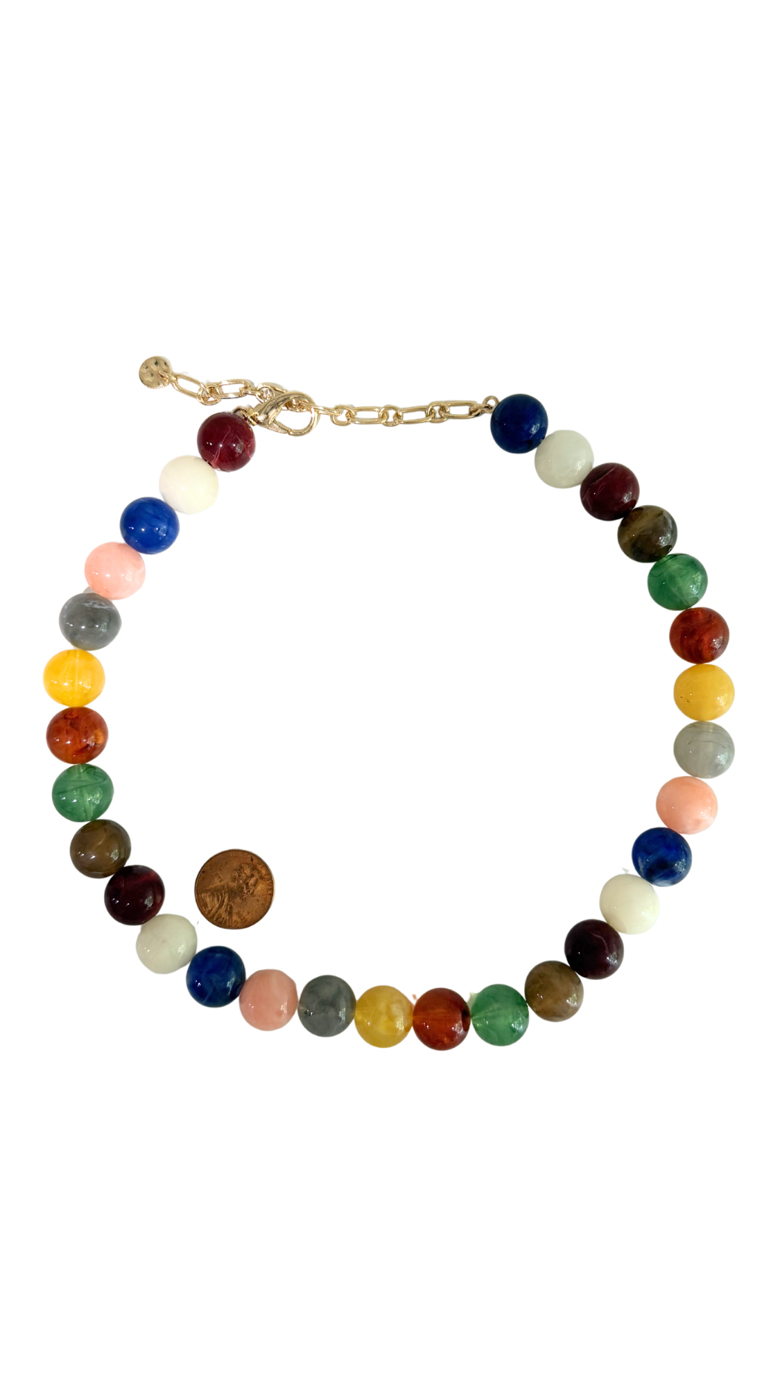 Multicolored beaded necklace on a white background