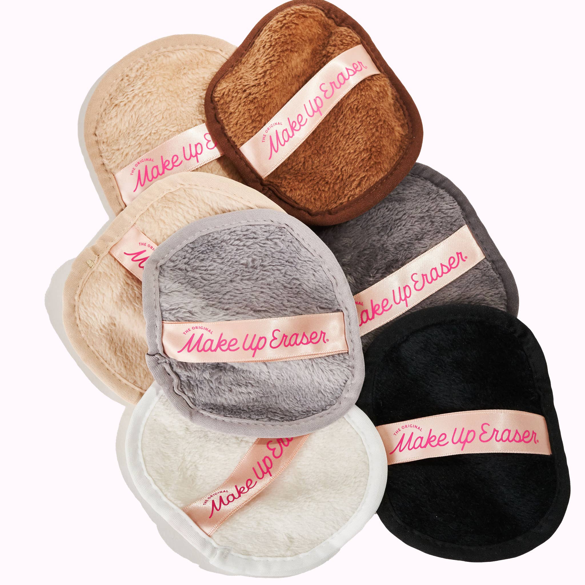 Makeup erasers in various colors with 'Make Up Eraser' branding on a white background