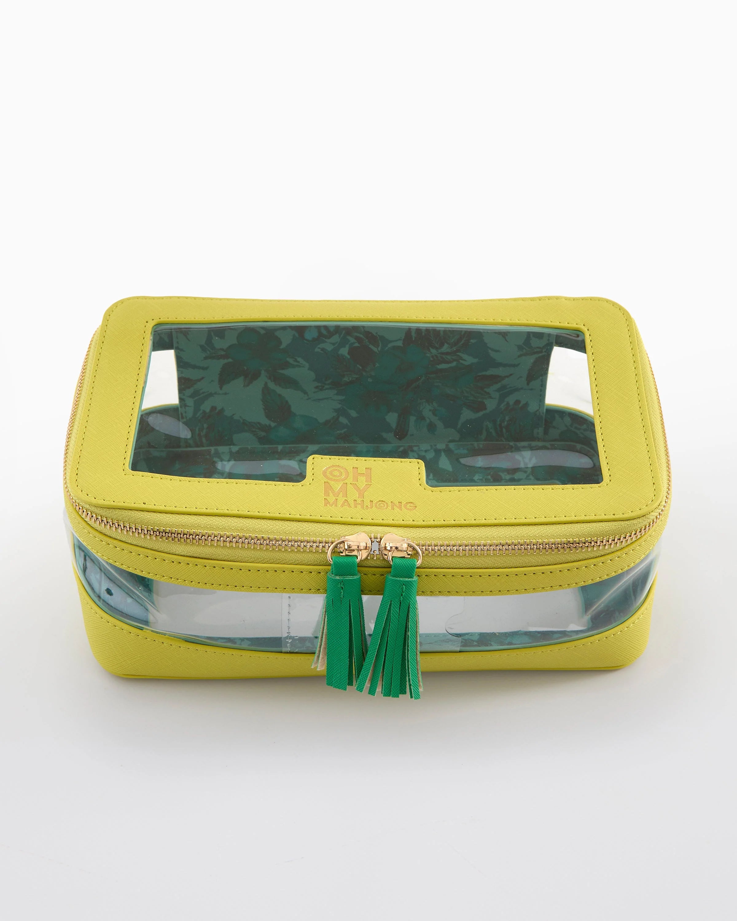 Yellow travel case with clear front panel and green tassel on a white background