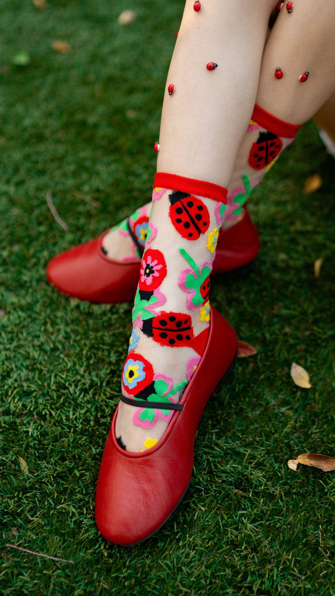 Lucky Ladybug sheer crew sock product photo - worn view - BLVD Boutik