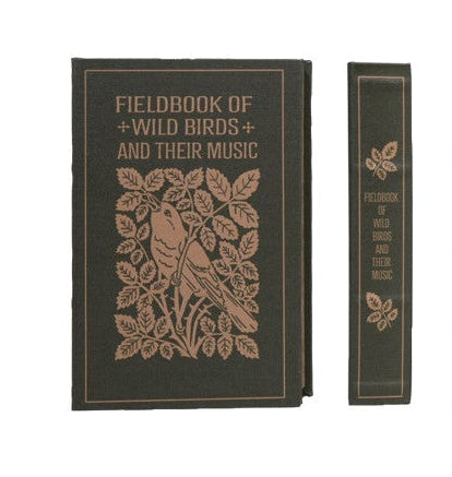 Collection of decorative books with various designs on a white background