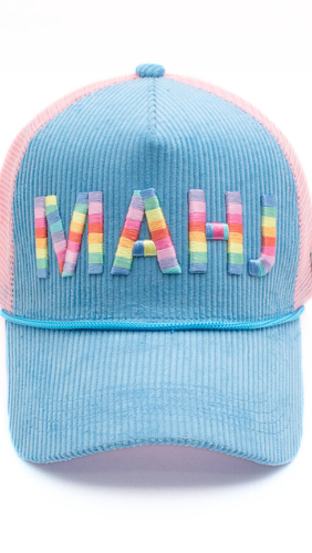 Blue cap with pink mesh back and colorful 'MAH' text on a white background