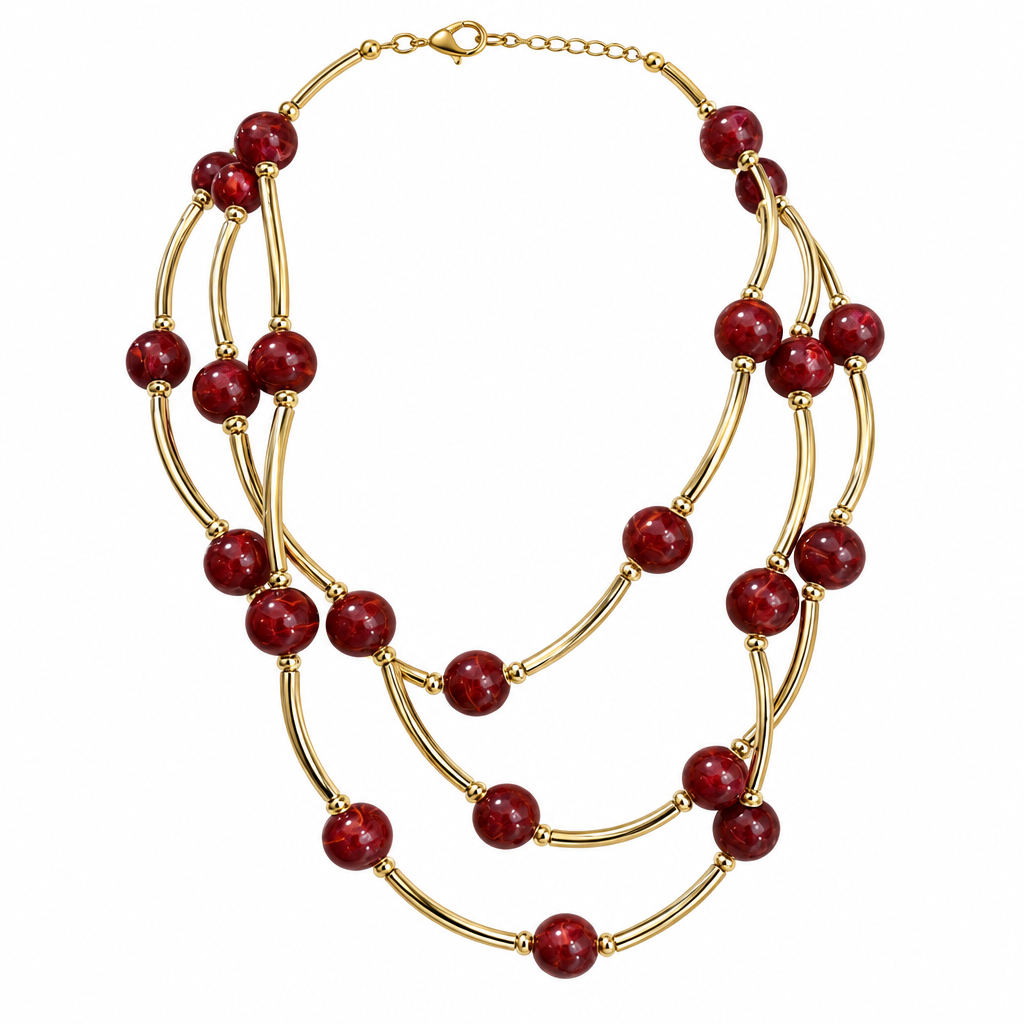 Burgundy multi-strand necklace alone on solid white