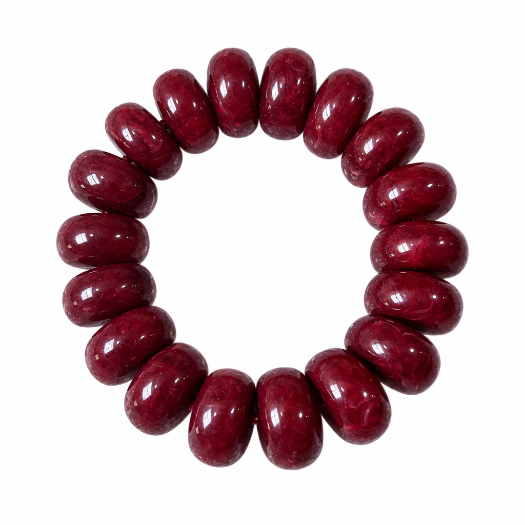Chunky rondelle bead stretch bracelet on white background, third view