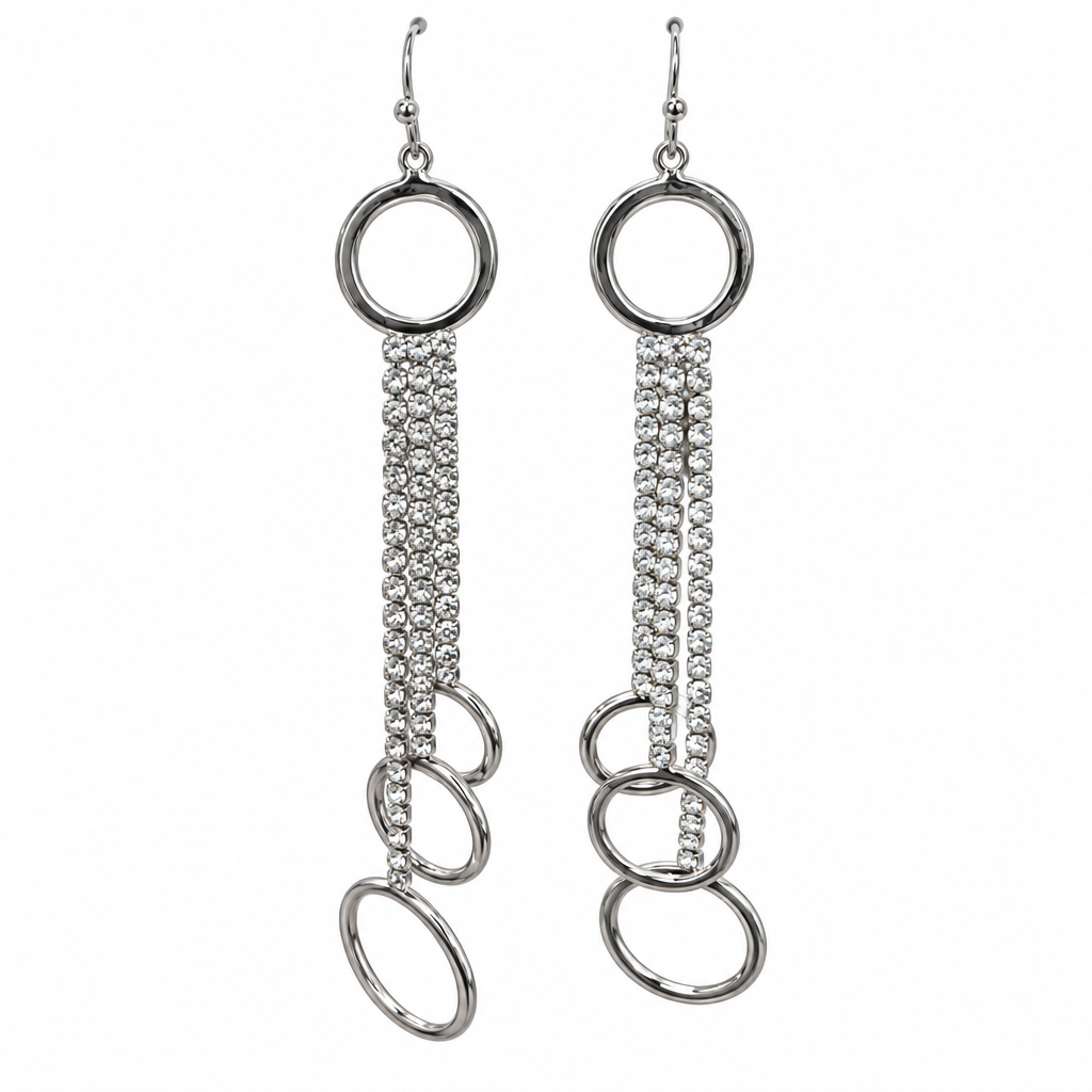 Silver rhinestone fringe and hoop earrings on white background