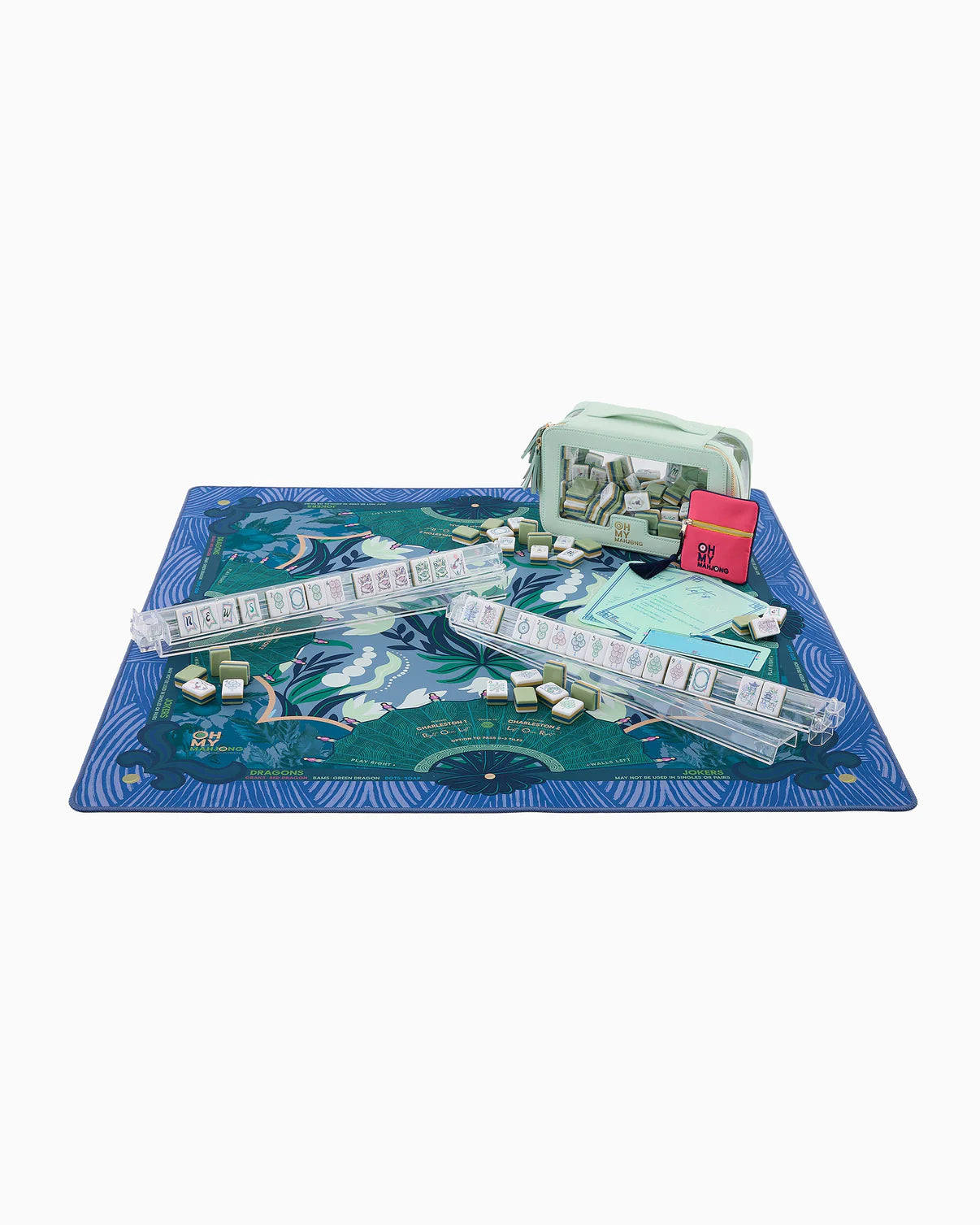 Board game set with a scenic mat and various components on a white background