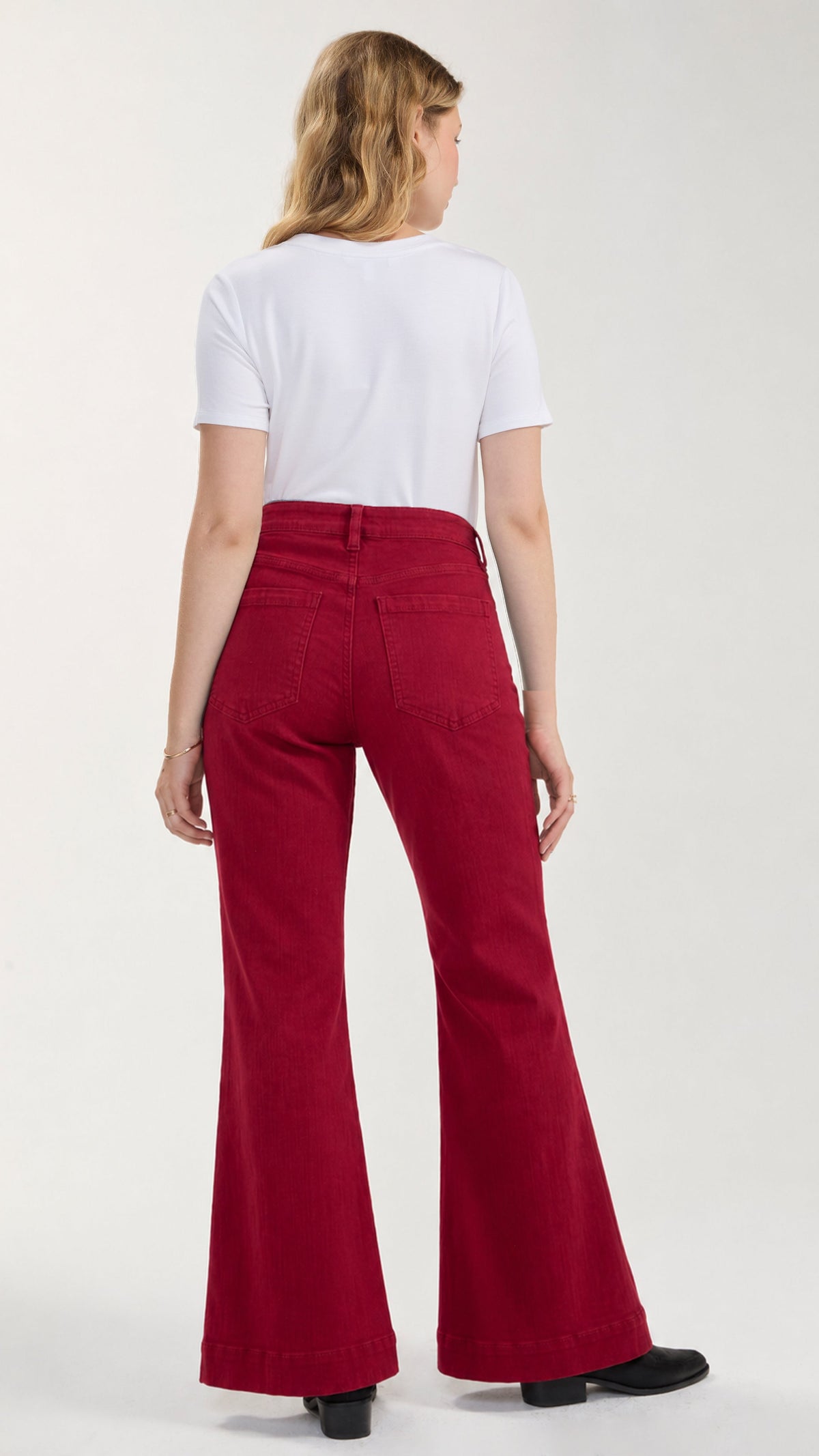 Back view of Hannah flare jeans in wild cranberry