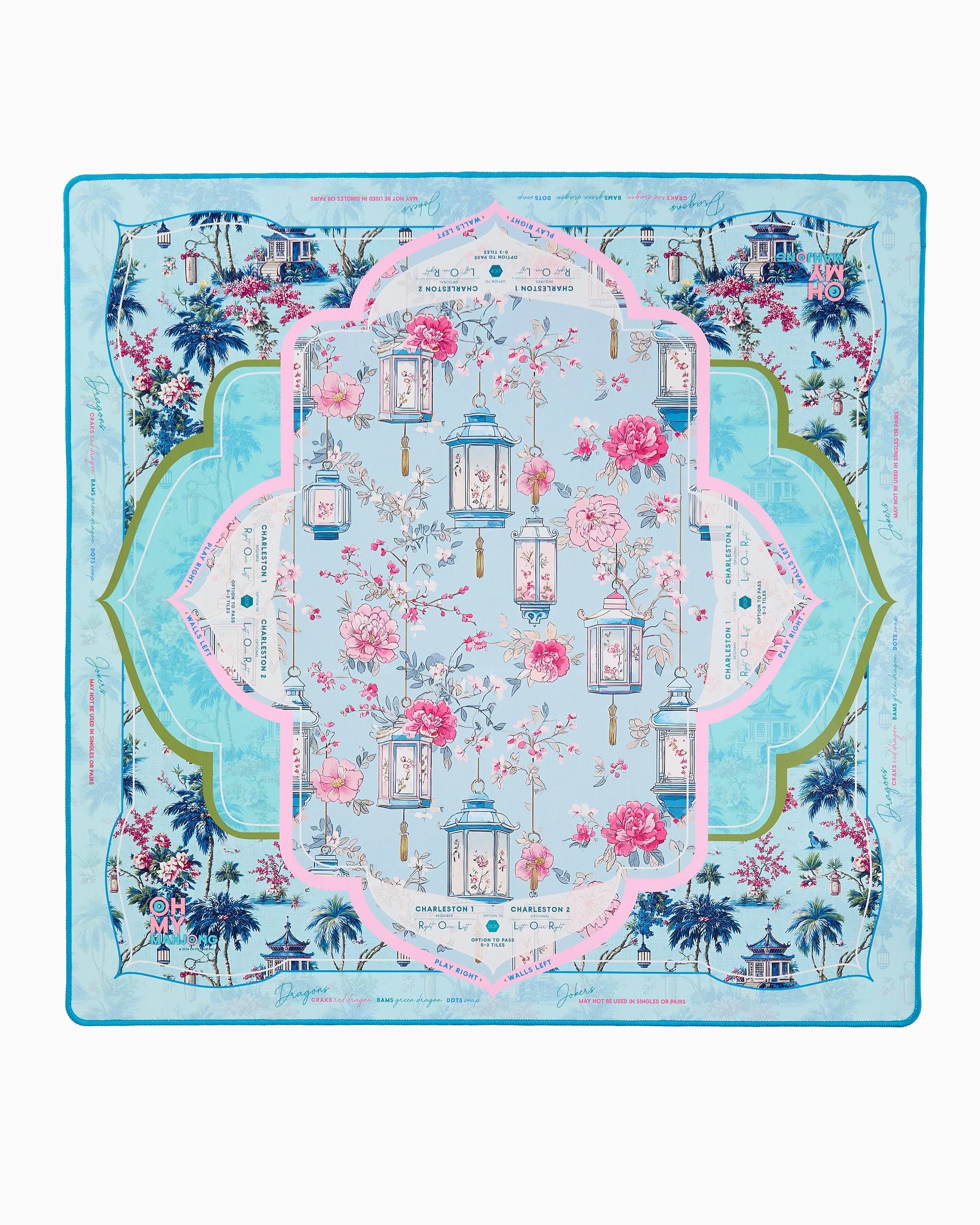 Decorative scarf with floral and architectural design on a blue background