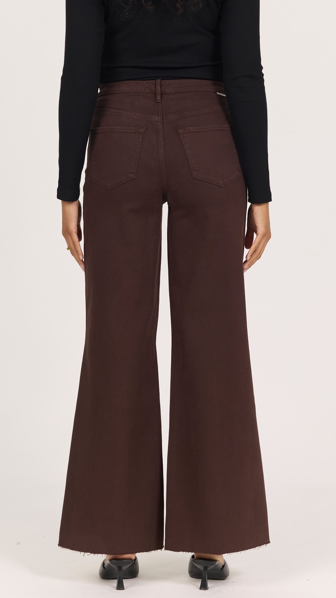 Back view of dark oak brown Fiona jeans showing the back pockets and wide leg