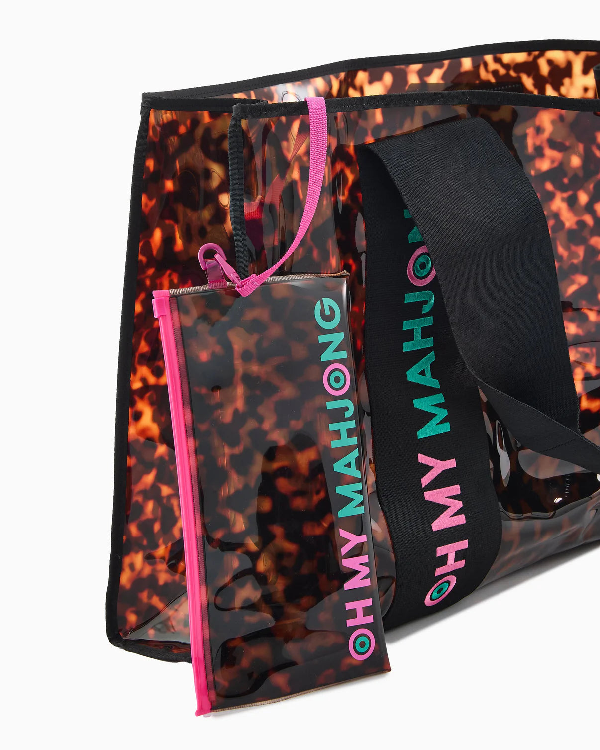 Tortoiseshell-patterned mahjong bag with 'Oh My Mahjong' branding on a white background
