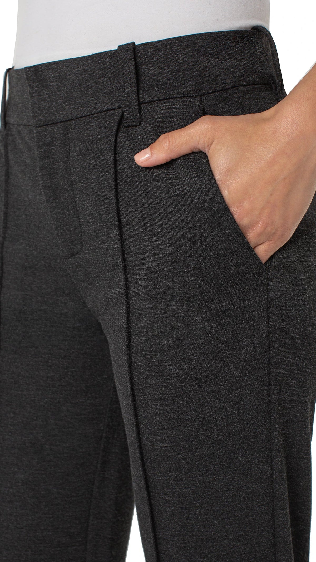 Close-up of waistband and slant pocket on heathered charcoal Gemma trousers