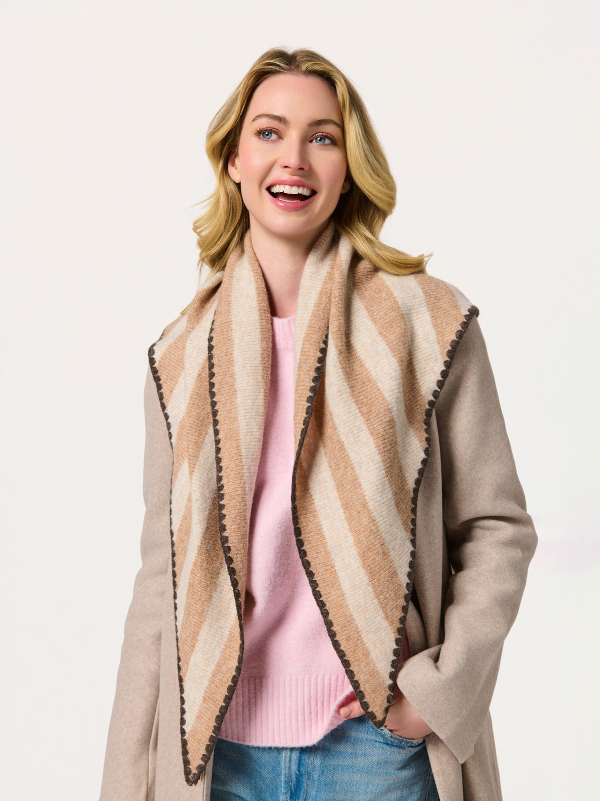 Shiraleah Joy Large Triangle Scarf in oatmeal and brown stripes, acrylic, polyester and wool knit, draped on model, lifestyle view