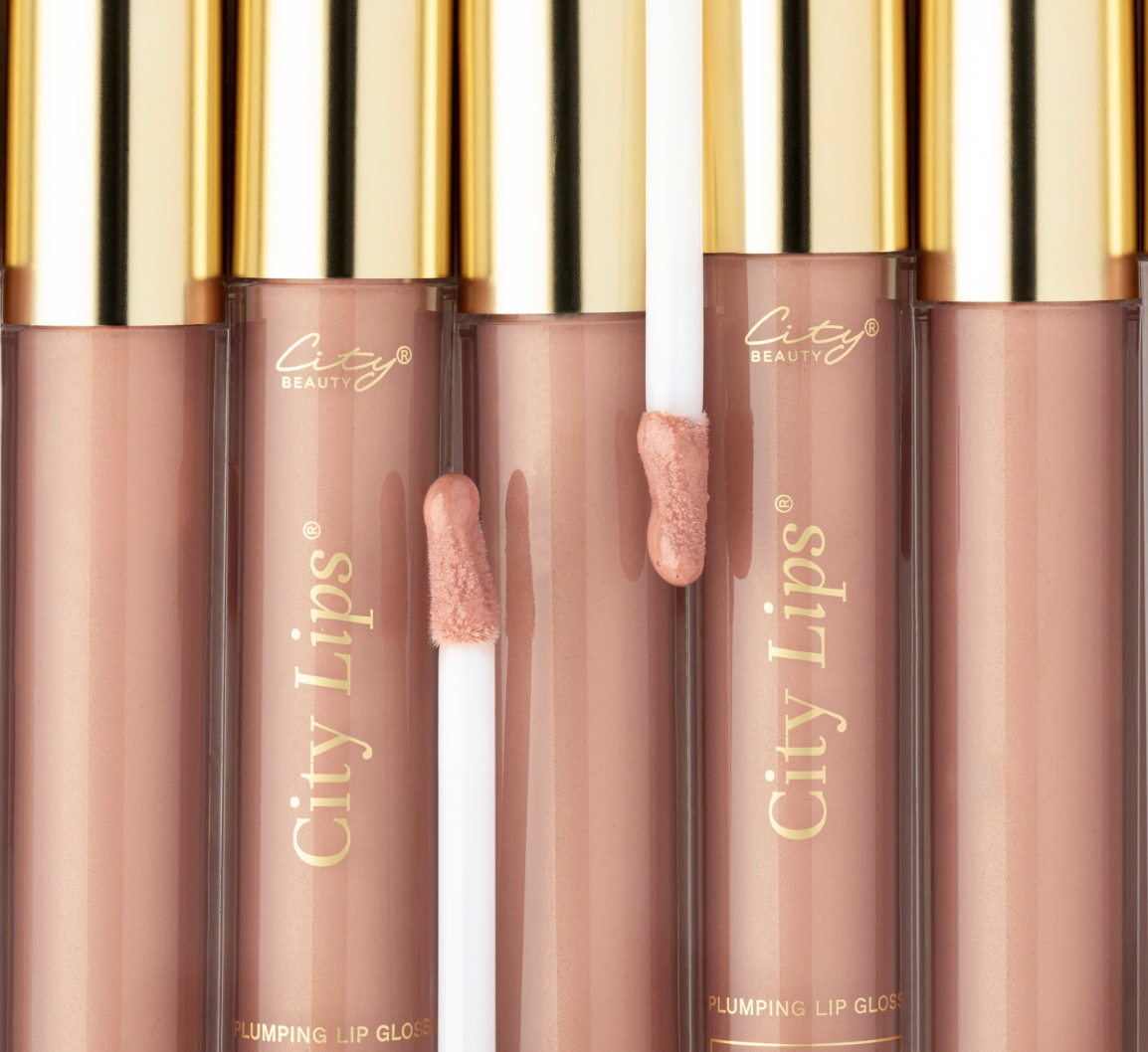City Lips plumping lip gloss in Tokyo Kiss, a sheer cool-nude shade