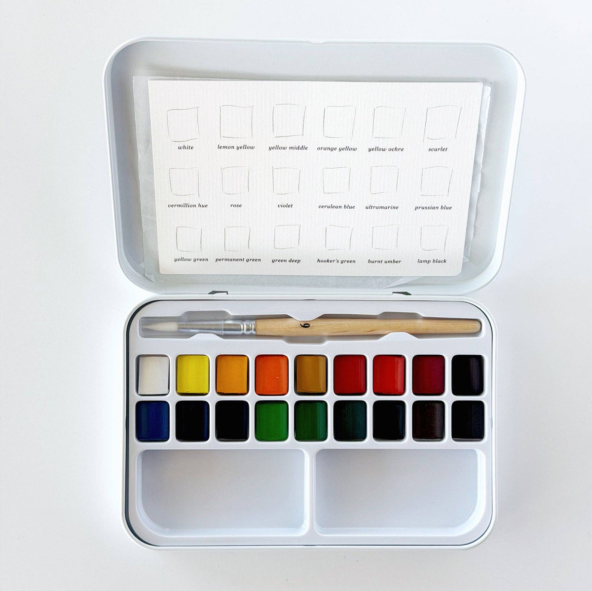 Watercolor paint set with 18 colors in a white metal tin