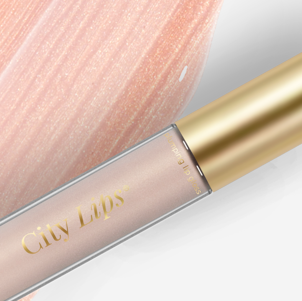 City Lips plumping lip gloss in Tokyo Kiss, a sheer cool-nude shade