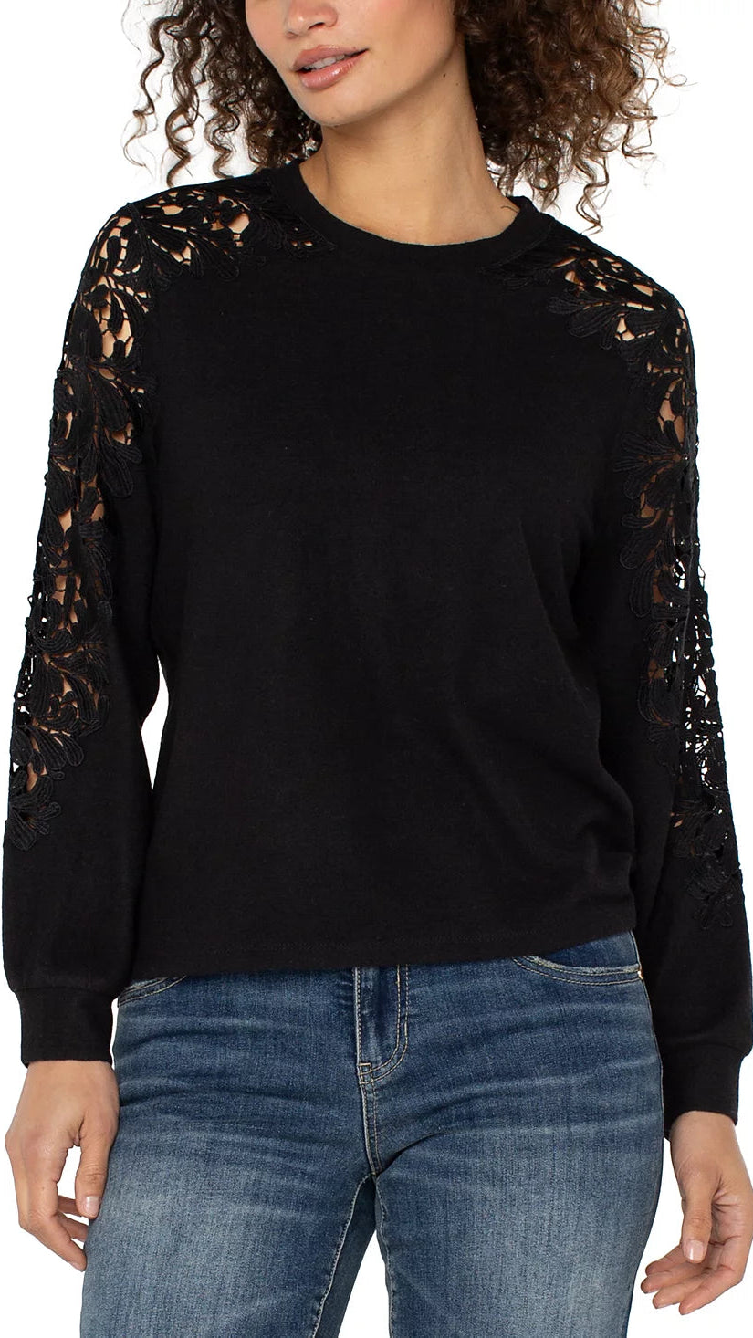 Lace sleeve crewneck top in black worn on model - front view - BLVD Boutik