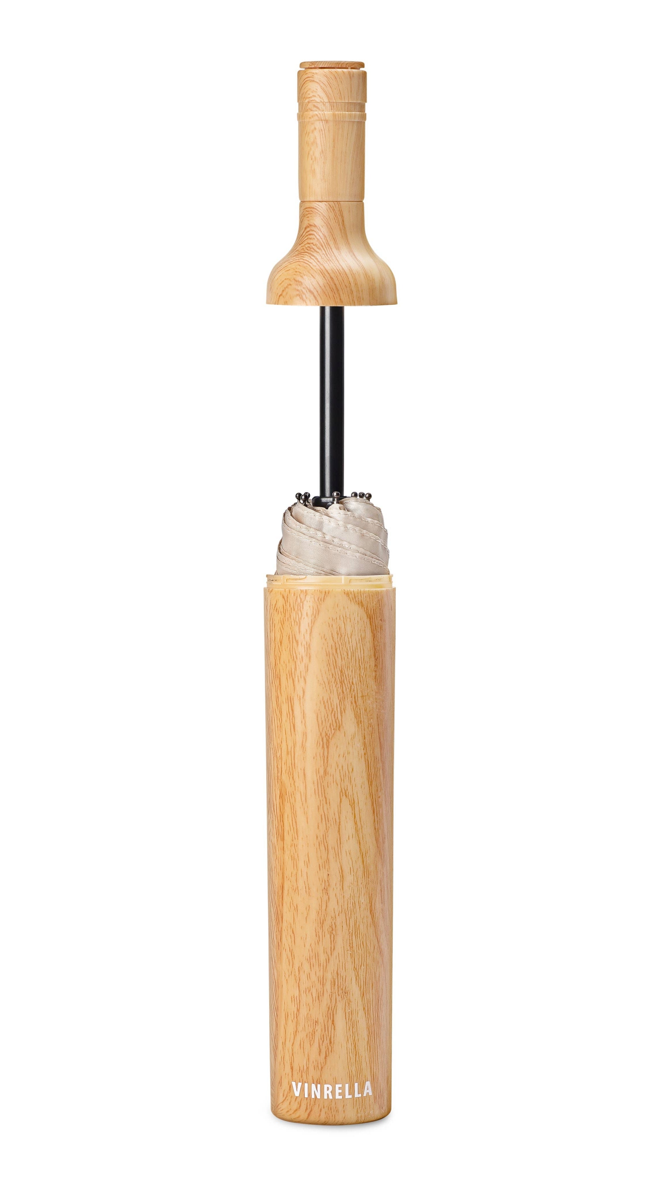 Wooden pepper grinder on a white background