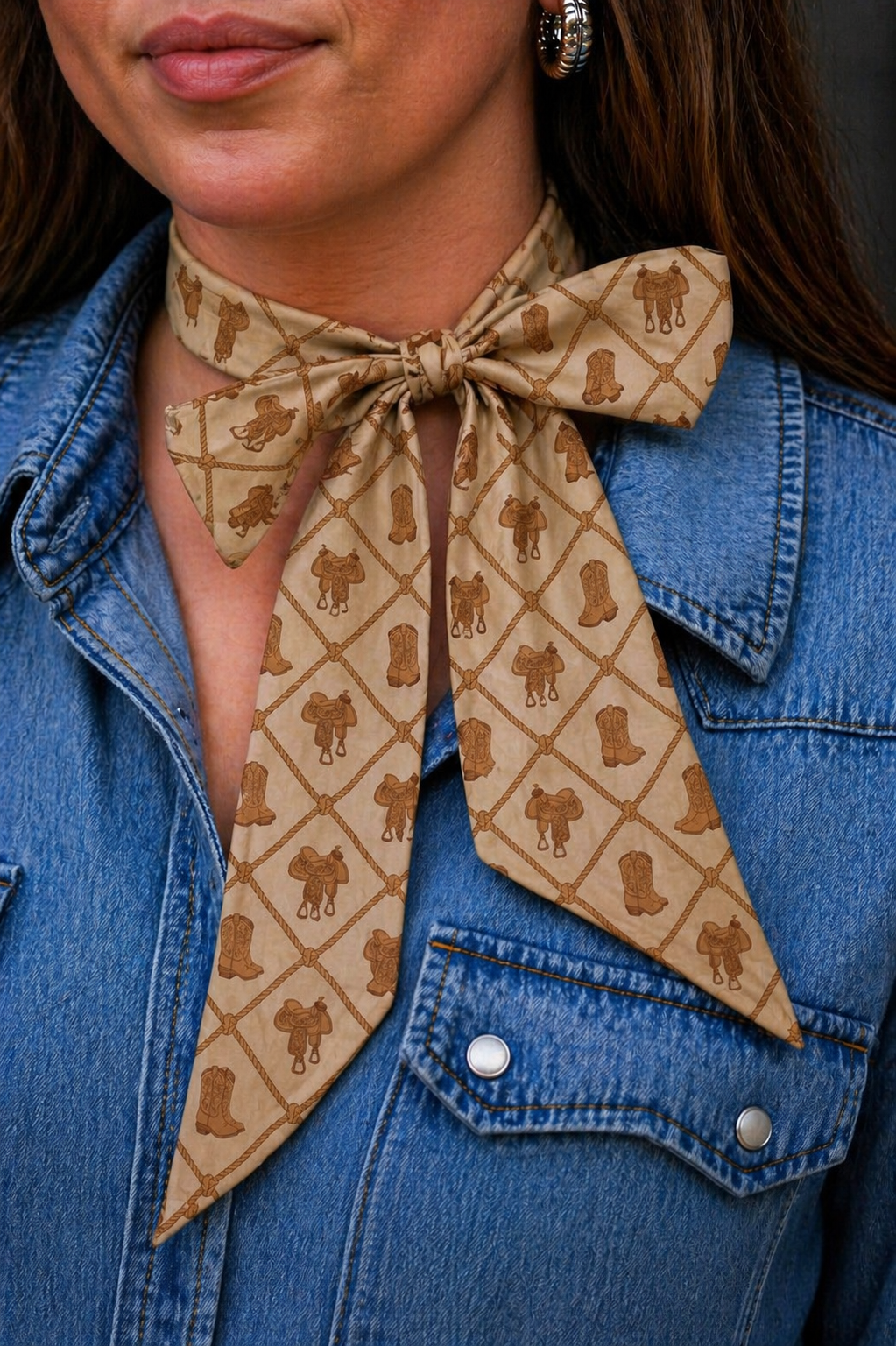 Cowboy boots print silk twilly tied at the neck with a denim shirt