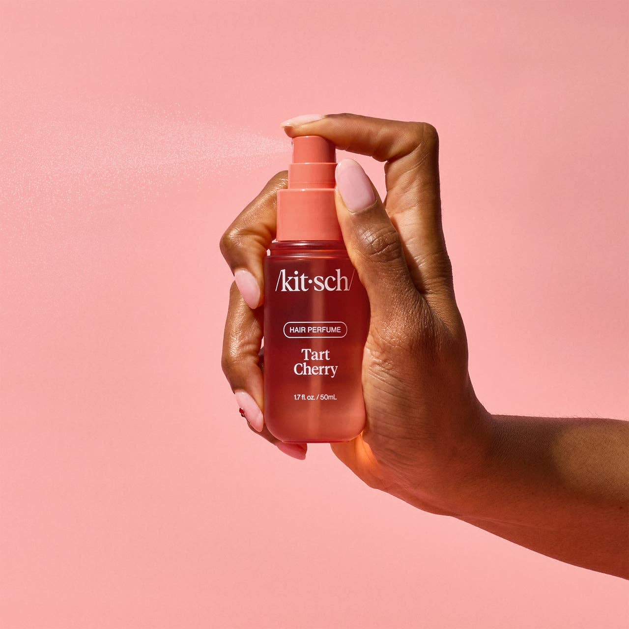 Tart Cherry hair perfume product photo - in use view - BLVD Boutik