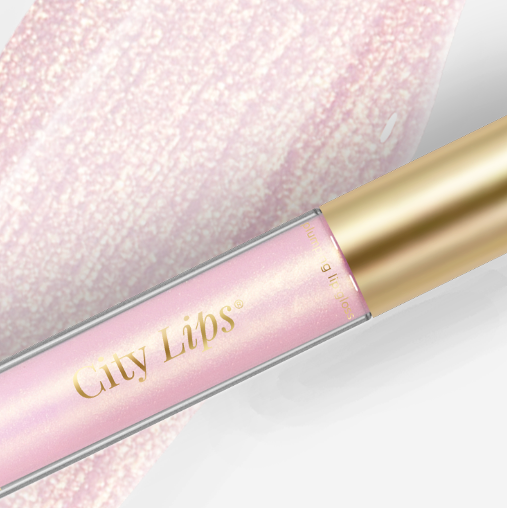 City Lips plumping lip gloss in Los Angelips, a sheer pink shade