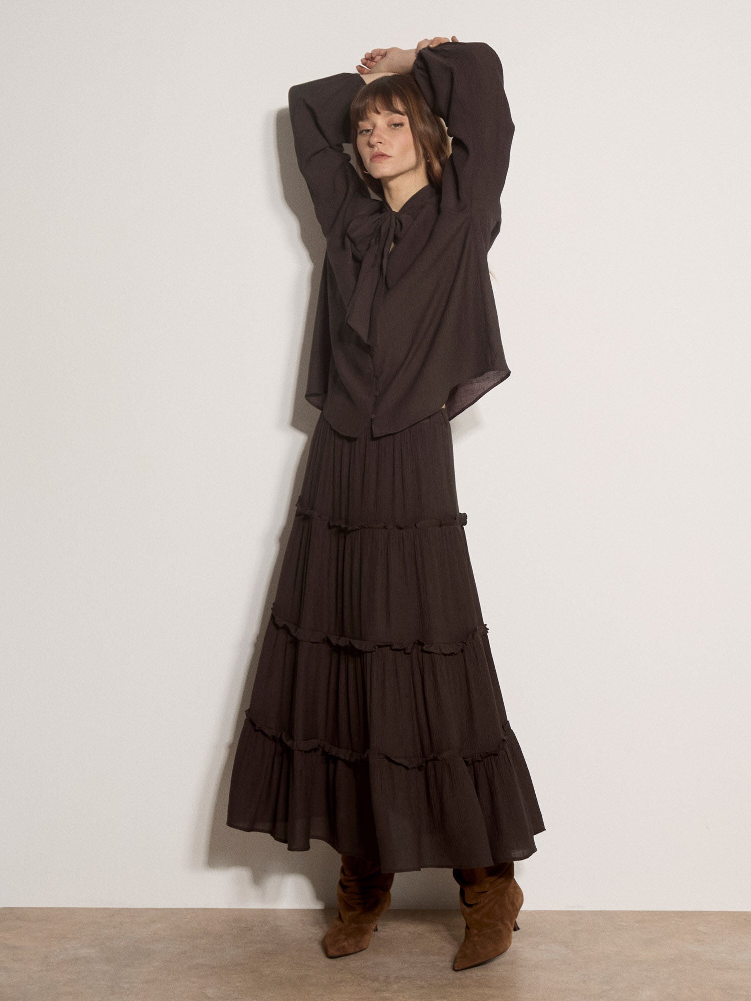 Brown crinkle tie neck blouse side view
