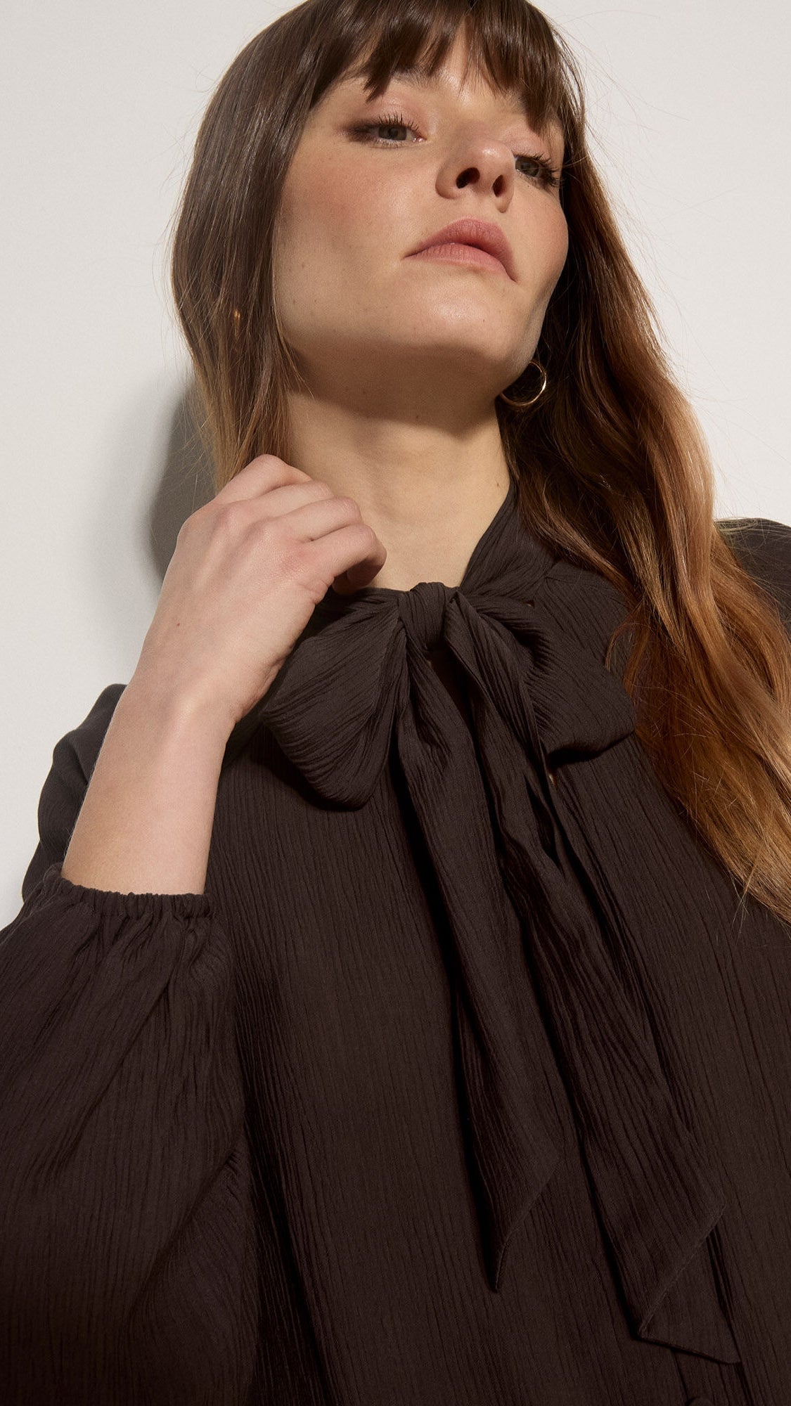 Brown crinkle textured tie neck blouse by Apricot
