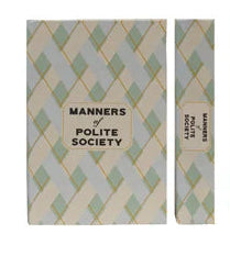 Set of small books with decorative covers on a white background