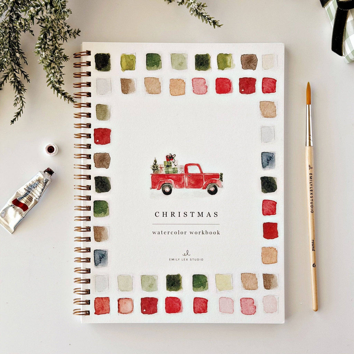 Classic Christmas watercolor workbook cover with red truck illustration