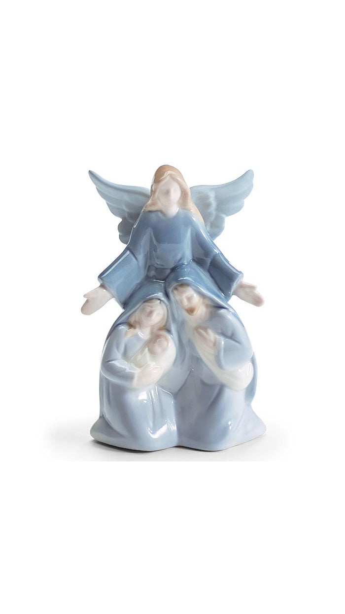 Blue and white ceramic Holy Family figurine with angel, front view