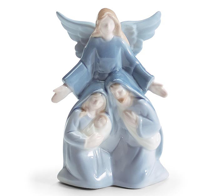 Blue and white ceramic Holy Family figurine with angel, full view