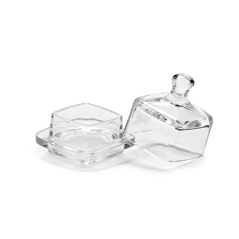 Two clear glass containers with lids on a white background