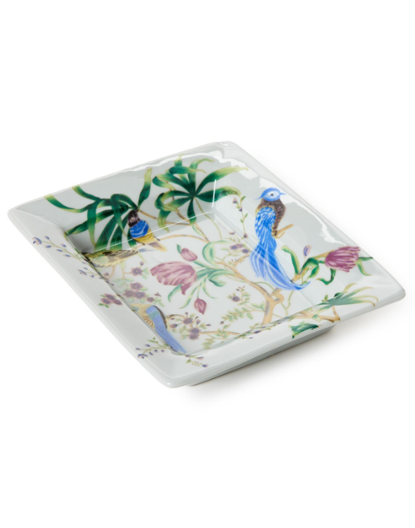 Decorative ceramic tray with floral and bird design on a white background