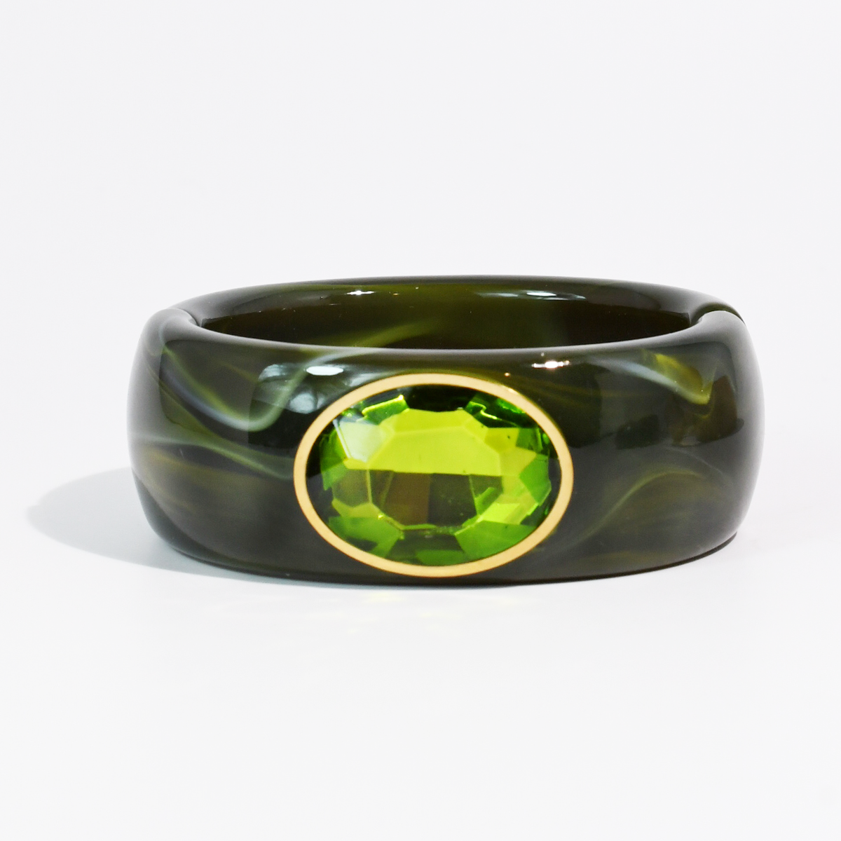 Olive green swirled resin cuff bracelet with faceted lime green oval stone in gold-tone setting