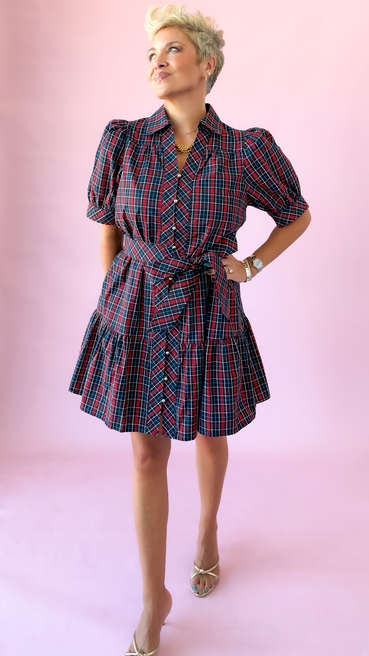 Navy and red plaid Angelica mini dress with puff sleeves, tie waist and tiered hem